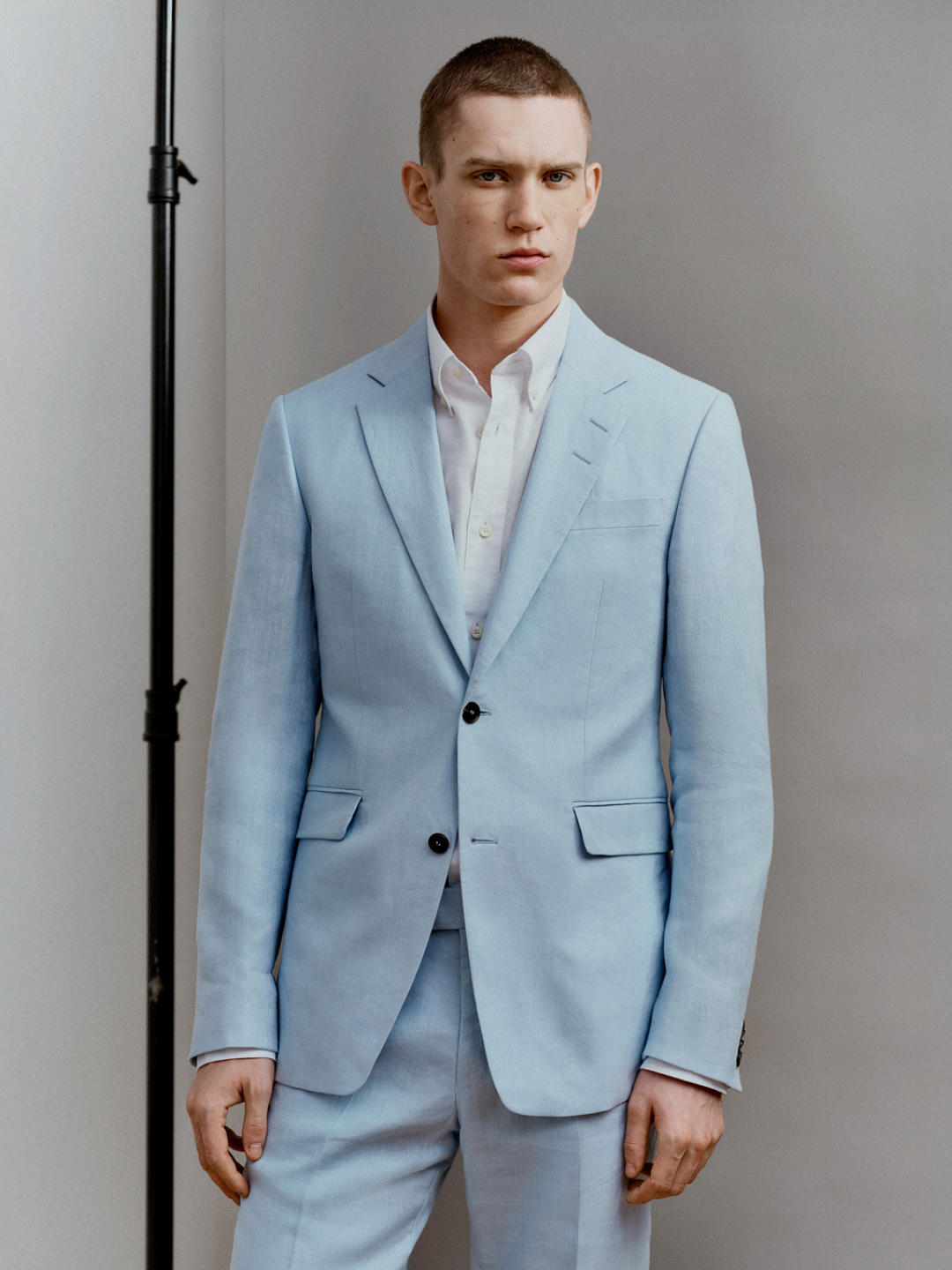 man in light beige suit